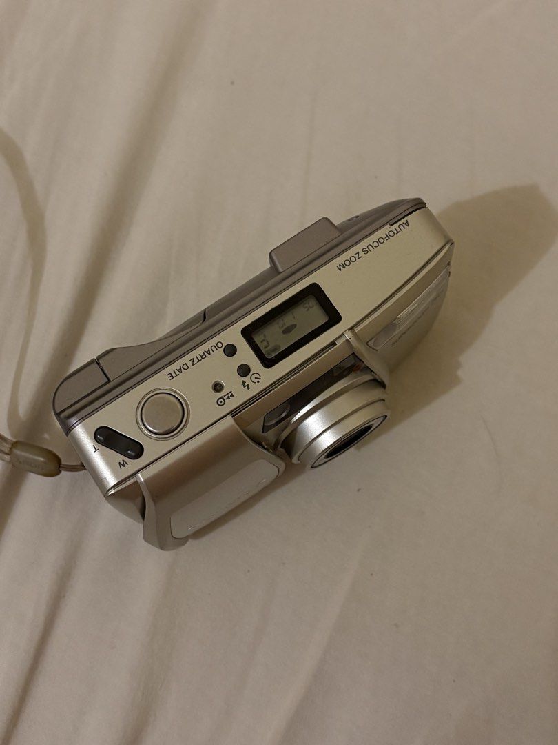 Olympus Superzoom 75s Autofocus Zoom Quartz Date Camera (Category: Cameras) located in Taguig. Submitted by aleksing (Listing ID 1461537919, Image 2). Description: - Olympus Superzoom 75s camera - Autofocus zoom lens - 38-76mm focal range - Built-in Quartz Date function - Includes wrist strap - Tested and confirmed working - Ideal for capturing memories.