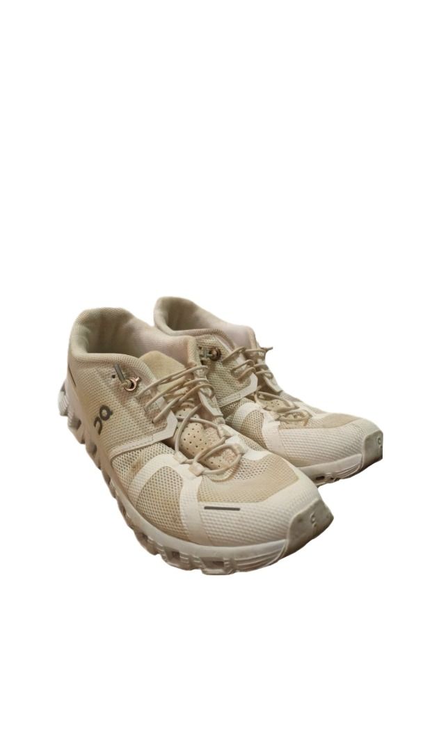 On Cloud 5 running shoes (Category: Sneakers) located in Las Pinas. Submitted by moonryse (Listing ID 1461424220, Image 2). Description: [ITEM DETAILS] * size: 6 * other details: off-white or cream colorway, featuring a breathable mesh upper, a signature speed-lacing system with knotted elastic laces, structured synthetic overlays, and the brand's iconic hollow CloudTec cushioned sole units. * condition: Slightly dirty and needs cleaning ! mop: g