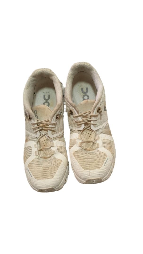 On Cloud 5 running shoes (Category: Sneakers) located in Las Pinas. Submitted by moonryse (Listing ID 1461424220, Image 3). Description: [ITEM DETAILS] * size: 6 * other details: off-white or cream colorway, featuring a breathable mesh upper, a signature speed-lacing system with knotted elastic laces, structured synthetic overlays, and the brand's iconic hollow CloudTec cushioned sole units. * condition: Slightly dirty and needs cleaning ! mop: g