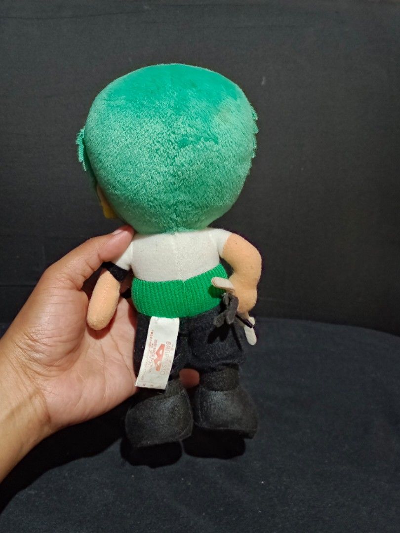 One-piece Roronoa Zoro' Vintage Plush 2000 (Category: Plushies & Soft Toys) located in Compostela. Submitted by buenaflora04681 (Listing ID 1461452810, Image 2). Description: 7-8 inches Get as is wyswyg....