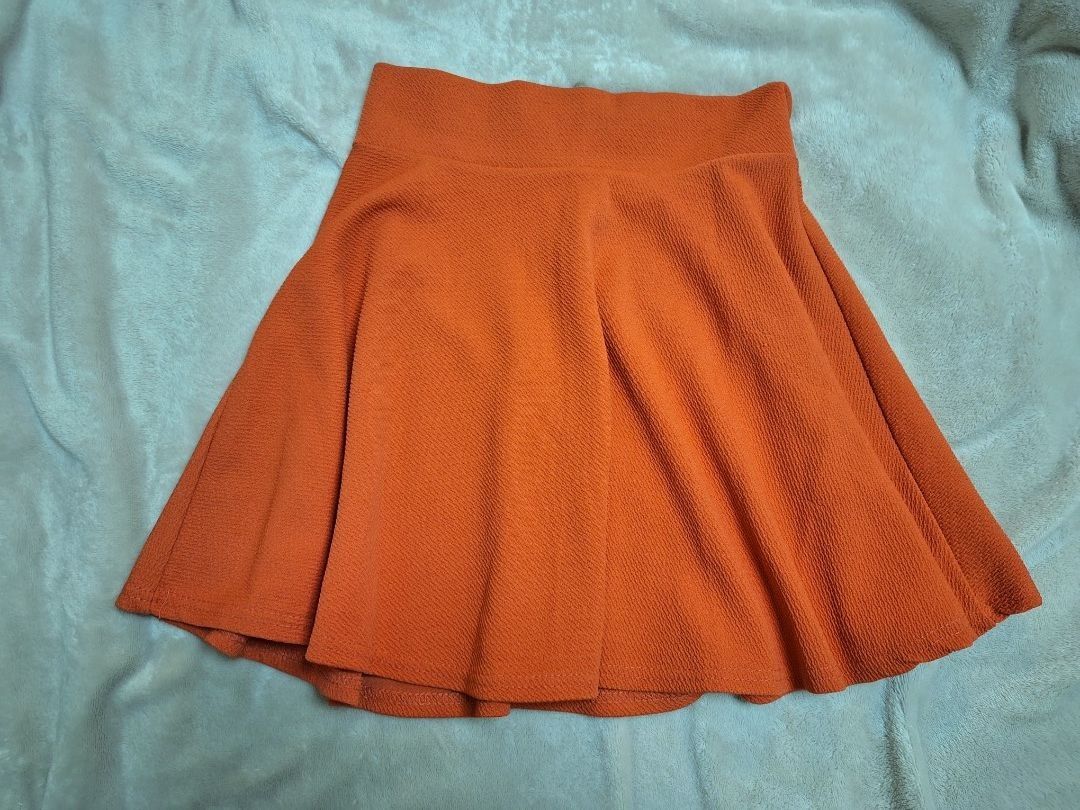 Orange Textured A-Line Mini Skirt (Category: Skirts) located in Manila. Submitted by mintchocoscoops (Listing ID 1461488925, Image 1). Description: >Stretchy Fabric >No flaws >No Holes or rips >No stains .