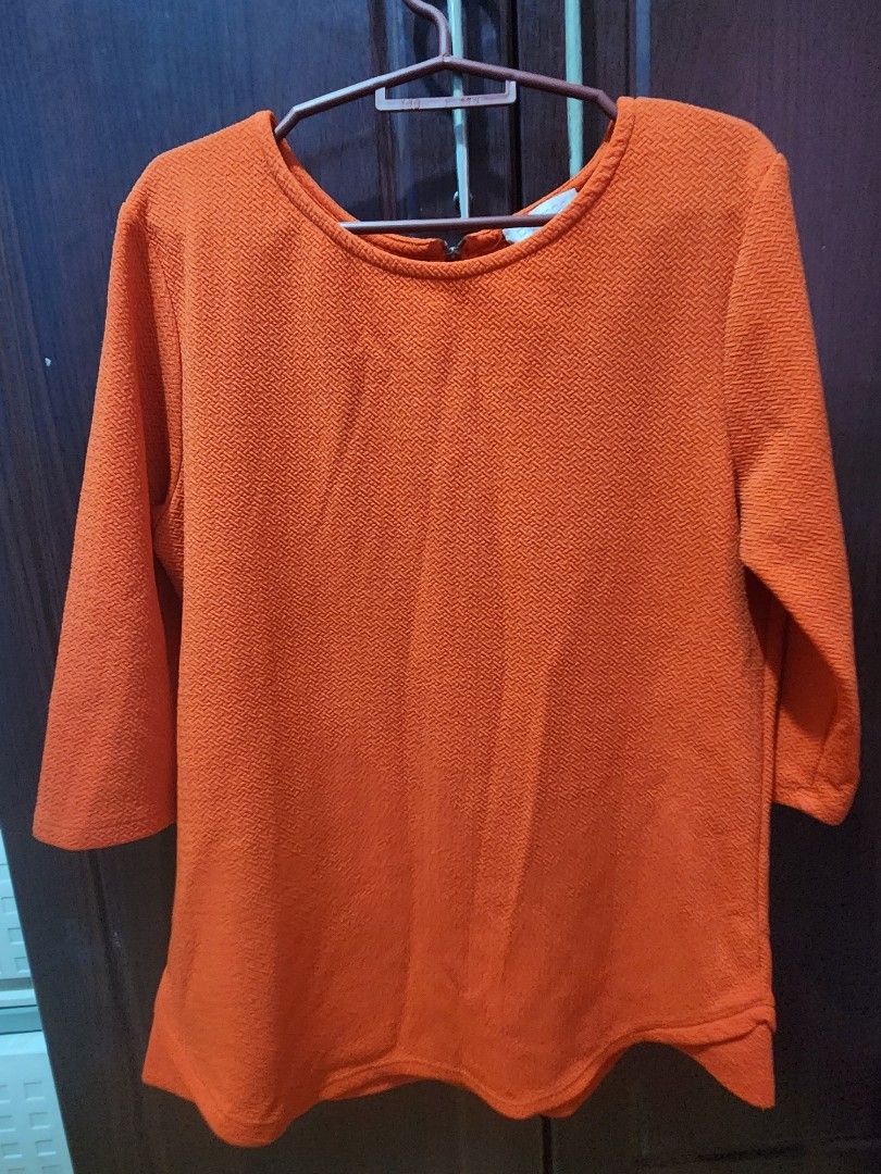 Orange Textured Long Sleeve Top (Category: Longsleeves) located in Muntinlupa City. Submitted by yanyan1888 (Listing ID 1461368999, Image 1). Description: - Textured orange long-sleeve top - Comfortable round neckline - Versatile for casual outings - Ideal for layering - Easy to style with various bottoms.
