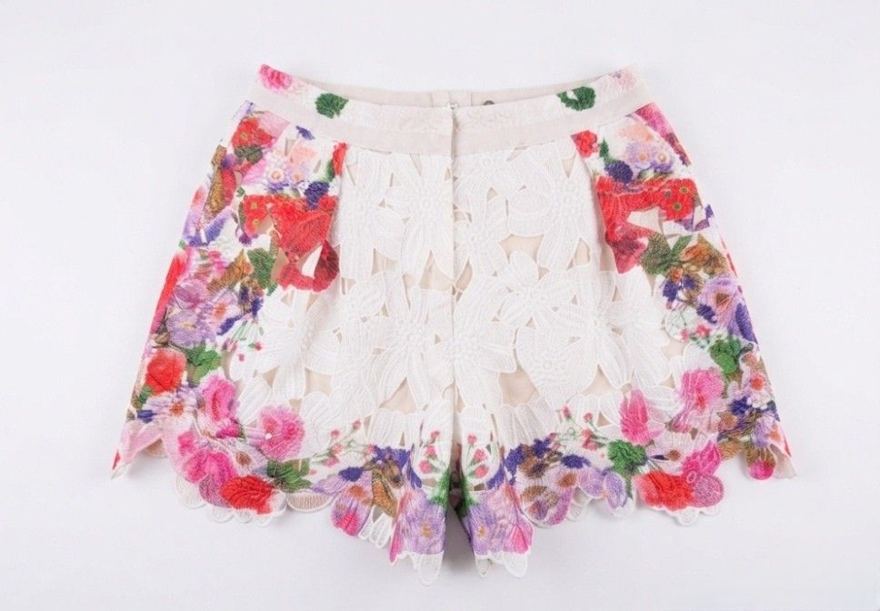 Orchid Embroidered Guipure Shorts (Category: Shorts) located in Donsol. Submitted by saksthriftavenuebyluckymaria8 (Listing ID 1461456791, Image 3). Description: - White guipure lace shorts - Vibrant floral embroidery - High-waisted design - Scalloped hem --Perfect for summer occasions - Pair with a simple top for a chic Look white orchid-embroidered guipure lace shorts with a scalloped hem . not stretchable 4 fits sz 30 waist 15in hips 25in leng