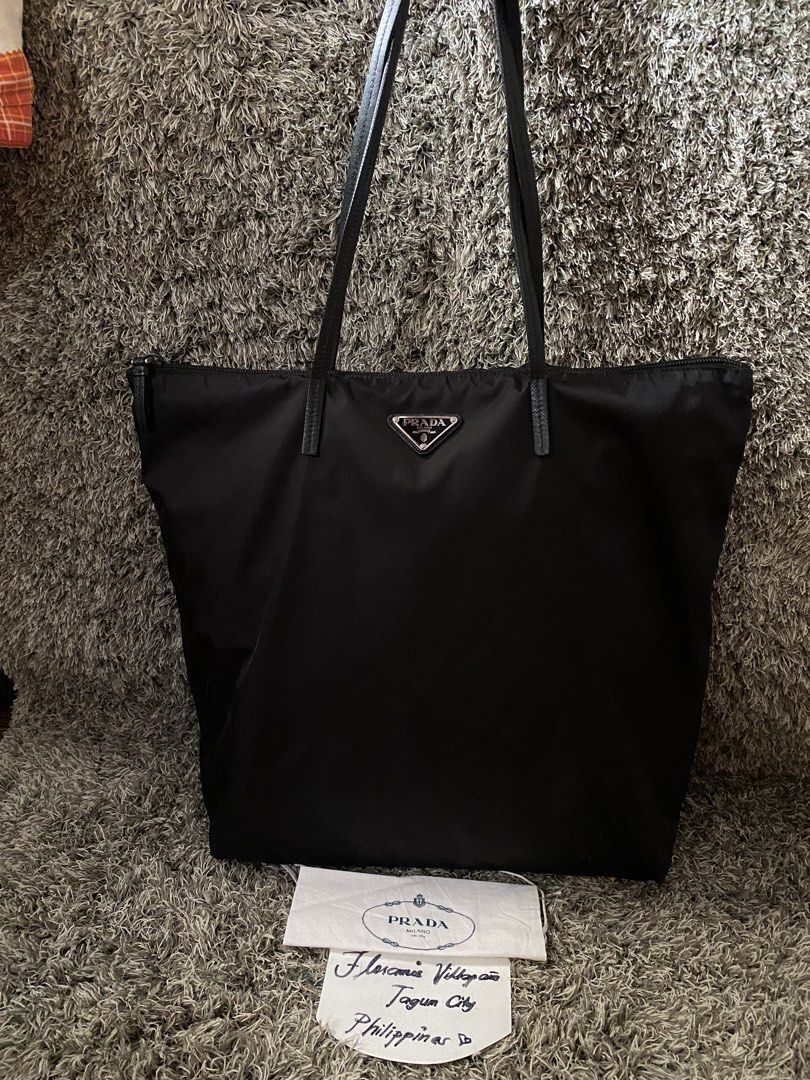 Orig prada (Category: Luxury Apparel) located in Tagum. Submitted by amarasluxbag (Listing ID 1461494488, Image 2). Description: Good condition With sign of use Black na black pa po yan lahat Not faded .