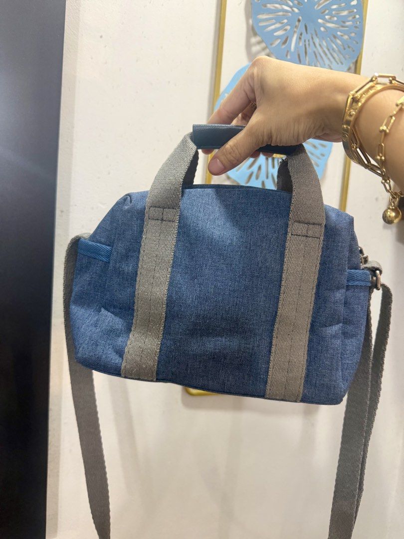 Original Anello Sling Bag (Category: Cross-body Bags) located in Bacoor. Submitted by xoxochean (Listing ID 1461365677, Image 2). Description: Bought from tokyo ph Original 💯 use twice. As NEW Size: 14cm X 20cm ~ Small size but Very spacious kasya phone & long wallet ~ See last photo for size refference. Selling 40% for its original price. Super mura! Bago pa 💯 Free shipping ✔️ 📍Bacoor, Cavite..