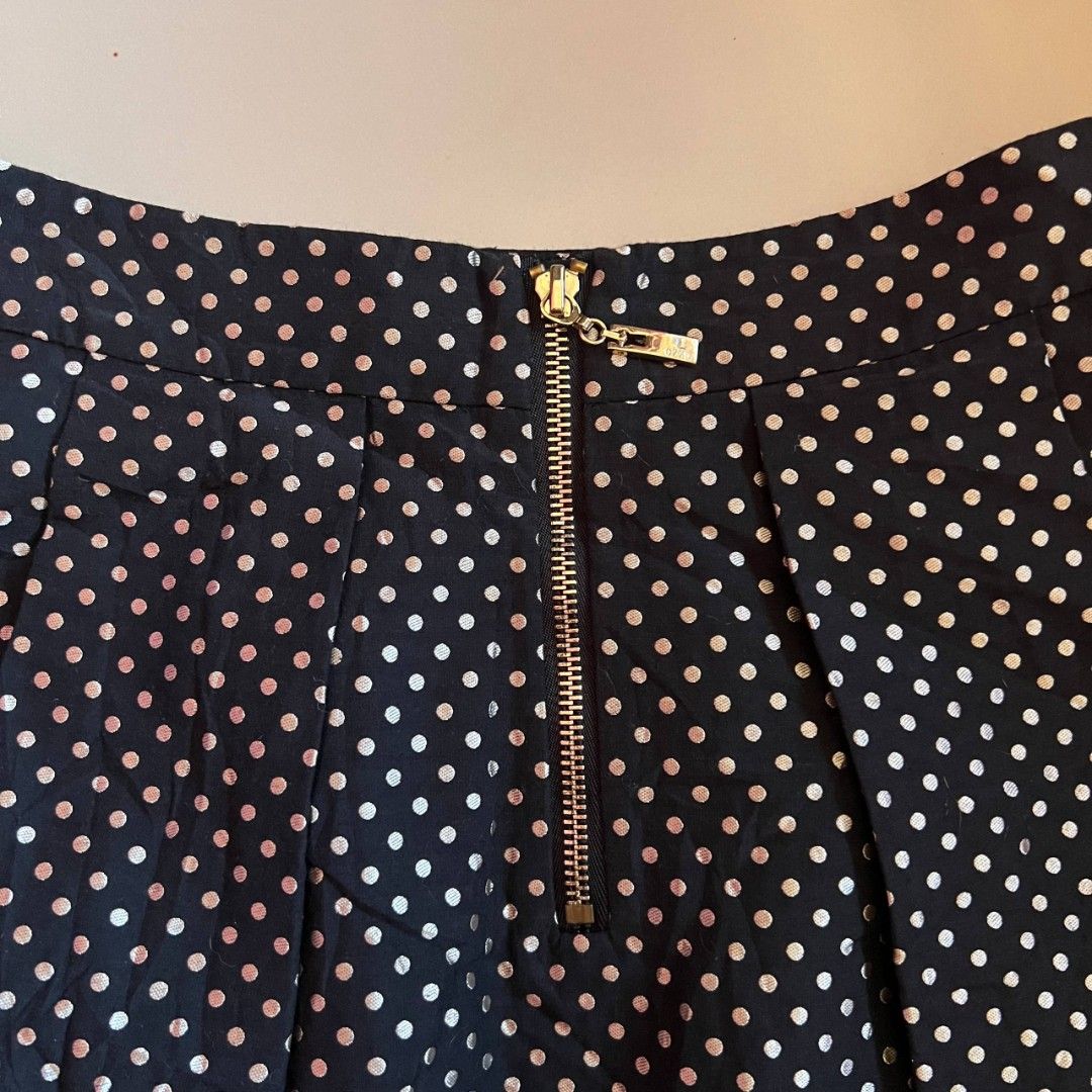 Black Polka Dots Skirts Y2k (Category: Skirts) located in General Trias. Submitted by wear_whimsy (Listing ID 1461280311, Image 3). Description: Size: 26-27 - Black skirt with all-over cream polka dots - Flared A-line silhouette - Gold zipper closure at the back - No issue but needs wash.