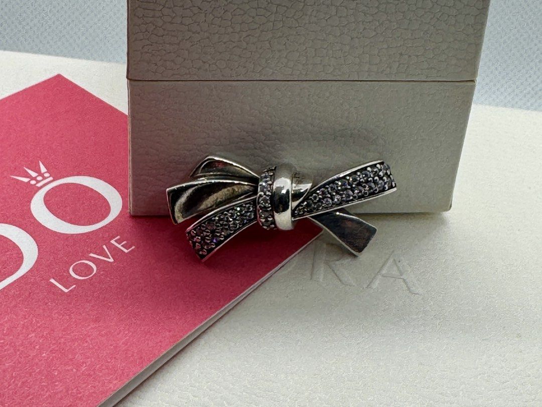 Pandora "Brilliant Bow" Oversized Charm (797241CZ) (Category: Charms) located in Cabanatuan. Submitted by water.withahintoflime (Listing ID 1461445541, Image 2). Description: Retired|Authentic S925 with Clear CZ P2 S925 ALE Hallmark Pre-owed|No issue|Normal wear With Complete Packaging.