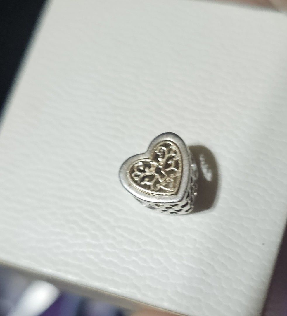 Pandora Locked Hearts Openwork 14k Gold Charm (Category: Charms) located in Manila. Submitted by onlinesmartshopping12 (Listing ID 1461436032, Image 2). Description: original no issue with 14k gold.