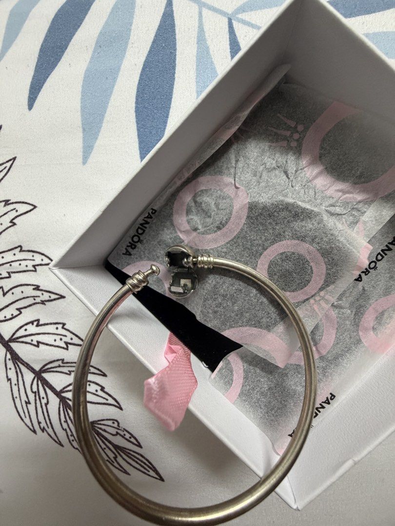Pandora Sterling Silver Bangle Bracelet with Clasp (Category: Bracelets) located in Bocaue. Submitted by graceeshoppe (Listing ID 1461405110, Image 3). Description: - size 17cm. - Authentic Pandora sterling silver bangle bracelet - Features the classic Pandora logo clasp - Comes with original Pandora box and tissue paper - Ideal for showcasing your favorite Pandora charms - Ready for its new home Location: General Trias, Cavite .