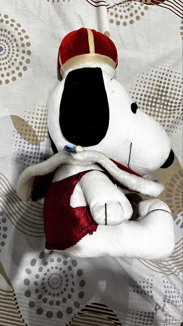 Peanuts Snoopy Plush Toy with King Crown and Cape (Category: Plushies & Soft Toys) located in Marikina City. Submitted by snoopydog1234 (Listing ID 1461343355, Image 3). Description: - Adorable Snoopy plush toy - Dressed as a king with a regal red cape and crown - Authentic United Feature Syndicate, Inc. product - Ideal for any Snoopy enthusiast - Great for decorative display or cozy cuddles.