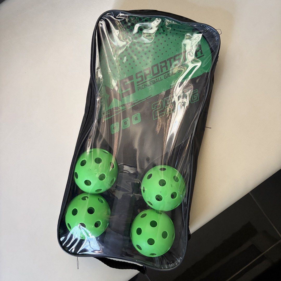 pickleball paddle set (Category: Racket and Ball Sports) located in Cainta. Submitted by comethruuu (Listing ID 1461332121, Image 2). Description: barely used for practice has 2 paddles na inside + 4 balls works well naman and can be used for beginners.