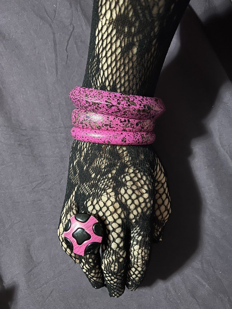 Pink Black Polka Dot Ring with Black Lace Gloves (Category: Rings) located in Pasig City. Submitted by mixpicks (Listing ID 1461363959, Image 3). Description: - Adorable pink and black polka dot ring. - Features a unique wooden texture on the pink areas. - Pairs perfectly with black lace gloves and pink bangles. - A fun and unique accessory to complete your outfit..