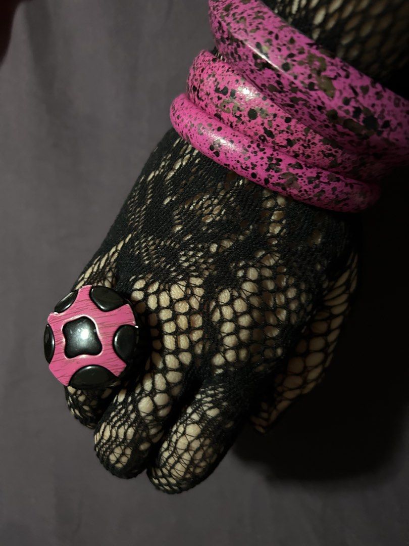 Pink Black Polka Dot Ring with Black Lace Gloves (Category: Rings) located in Pasig City. Submitted by mixpicks (Listing ID 1461363959, Image 2). Description: - Adorable pink and black polka dot ring. - Features a unique wooden texture on the pink areas. - Pairs perfectly with black lace gloves and pink bangles. - A fun and unique accessory to complete your outfit..