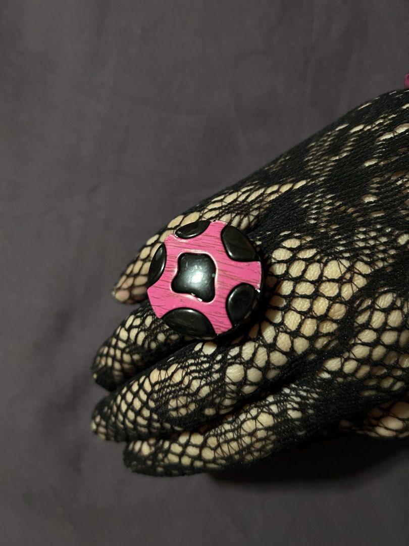 Pink Black Polka Dot Ring with Black Lace Gloves (Category: Rings) located in Pasig City. Submitted by mixpicks (Listing ID 1461363959, Image 1). Description: - Adorable pink and black polka dot ring. - Features a unique wooden texture on the pink areas. - Pairs perfectly with black lace gloves and pink bangles. - A fun and unique accessory to complete your outfit..