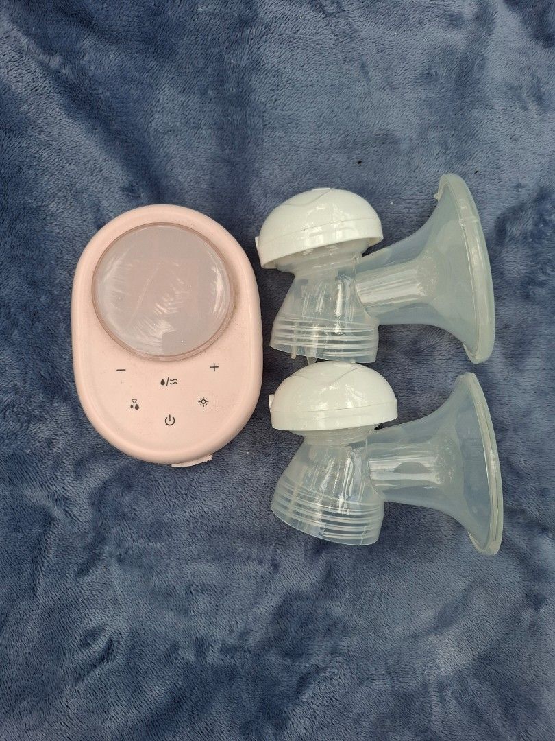Pink Electric Breast Pump with Double Flanges (Category: Breastfeeding & Bottle Feeding) located in Laak (San Vicente). Submitted by goldierocks0329 (Listing ID 1461388428, Image 1). Description: not rechargeable na. need to plug to use flanges are like new. kakabili ko lang but tried once lang, mas nahiyang sa lackteck.