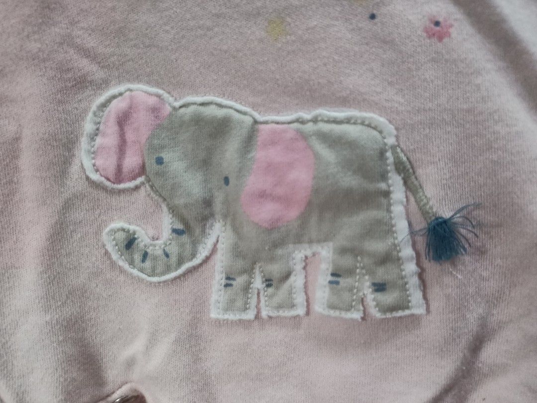 Pink Elephant Ruffle Sleeve Baby Romper (Category: Babies & Kids Fashion) located in Manila. Submitted by mikeeko (Listing ID 1461430504, Image 2). Description: - Adorable pink baby romper - Features a sweet elephant applique - Cute ruffle sleeves and frilly hem - Convenient snap closure for easy diaper changes - Made from soft and comfortable fabric - Perfect for everyday wear -RFS: Decluttering .
