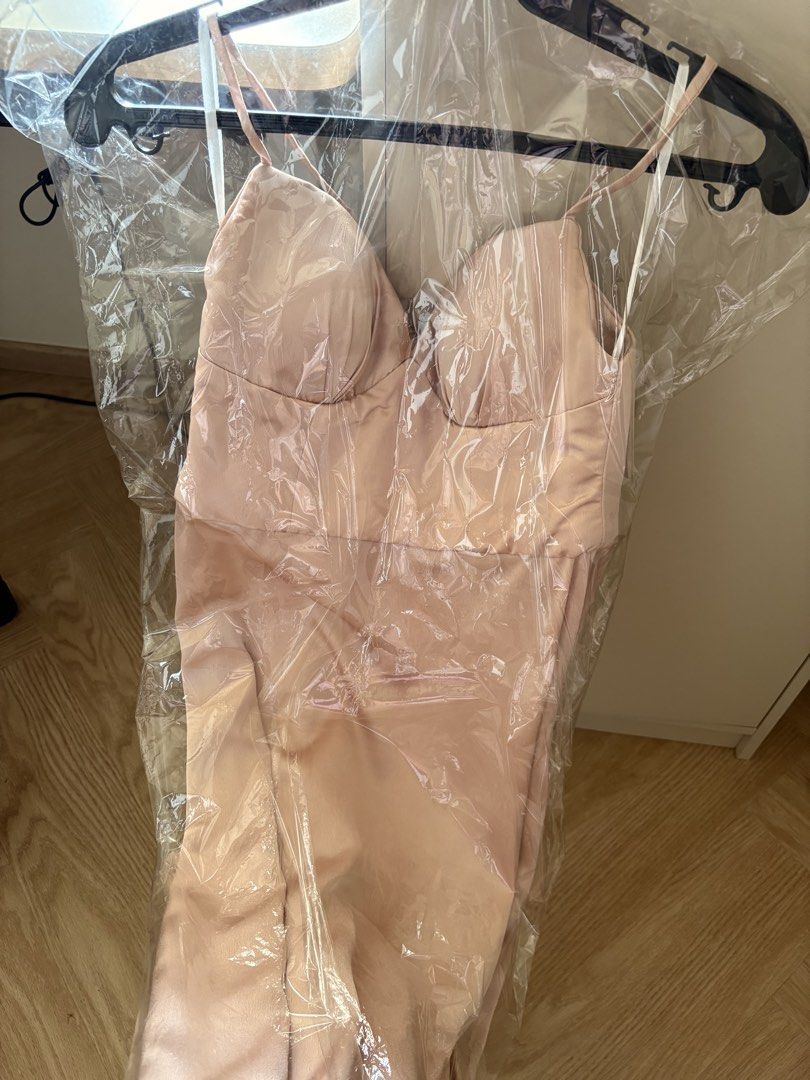 Pink Gown (Category: Dresses) located in Pasig City. Submitted by dcvirata (Listing ID 1461376571, Image 2). Description: - Light pink satin slip dress - Spaghetti straps - Sweetheart neckline with boning detail - Midi length - Ideal for weddings - Can pair with Filipiniana top see last photo.