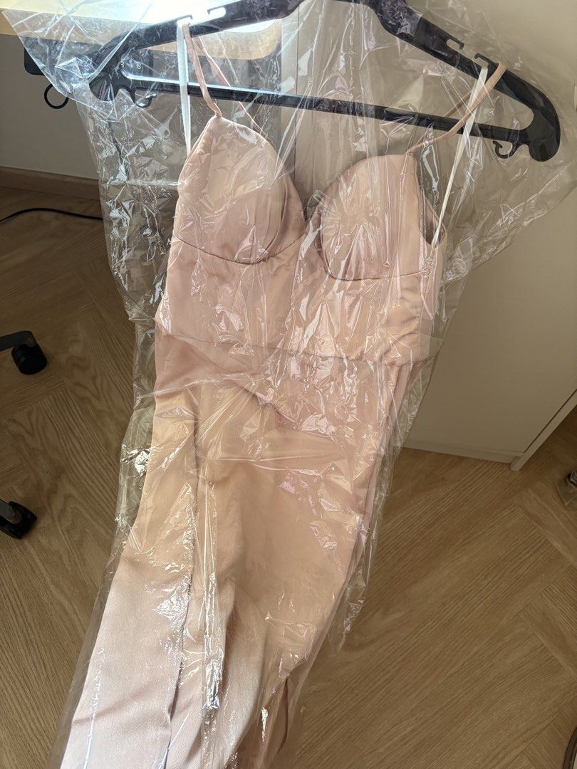 Pink Gown (Category: Dresses) located in Pasig City. Submitted by dcvirata (Listing ID 1461376571, Image 1). Description: - Light pink satin slip dress - Spaghetti straps - Sweetheart neckline with boning detail - Midi length - Ideal for weddings - Can pair with Filipiniana top see last photo.