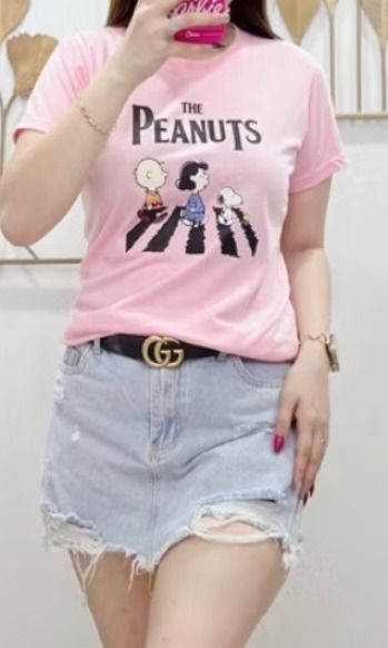 Pink Peanuts T-shirt - Large (Category: Shirts) located in Manila. Submitted by katkween23 (Listing ID 1461352849, Image 2). Description: - Adorable pink t-shirt with classic Peanuts characters: Charlie Brown, Lucy, and Snoopy. - Made from comfortable and breathable 100% cotton. - Size: Large (L). - Ideal for everyday casual wear. - A fantastic gift for any Peanuts enthusiast!.