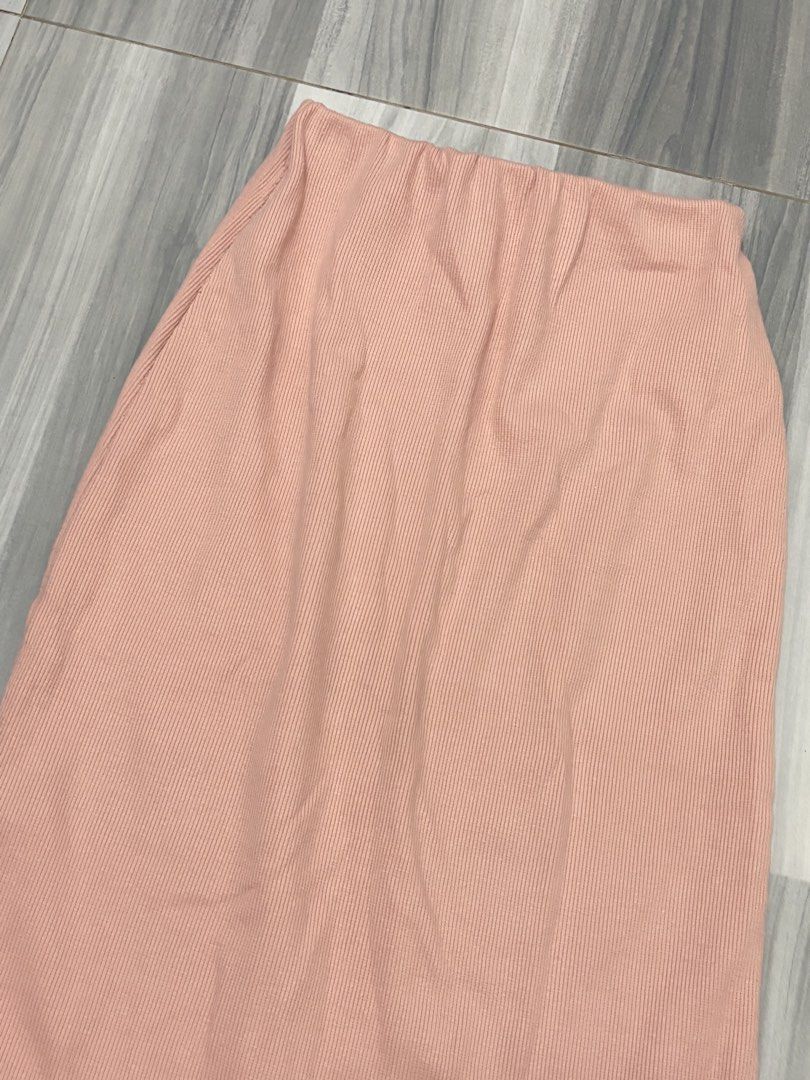 Pink Ribbed Midi Skirt (Category: Skirts) located in Manila. Submitted by lovedbynabix (Listing ID 1461447623, Image 2). Description: Comfy pink midi skirt with ribbed texture and elastic waist. Straight cut, calf-length. Versatile for any occasion..