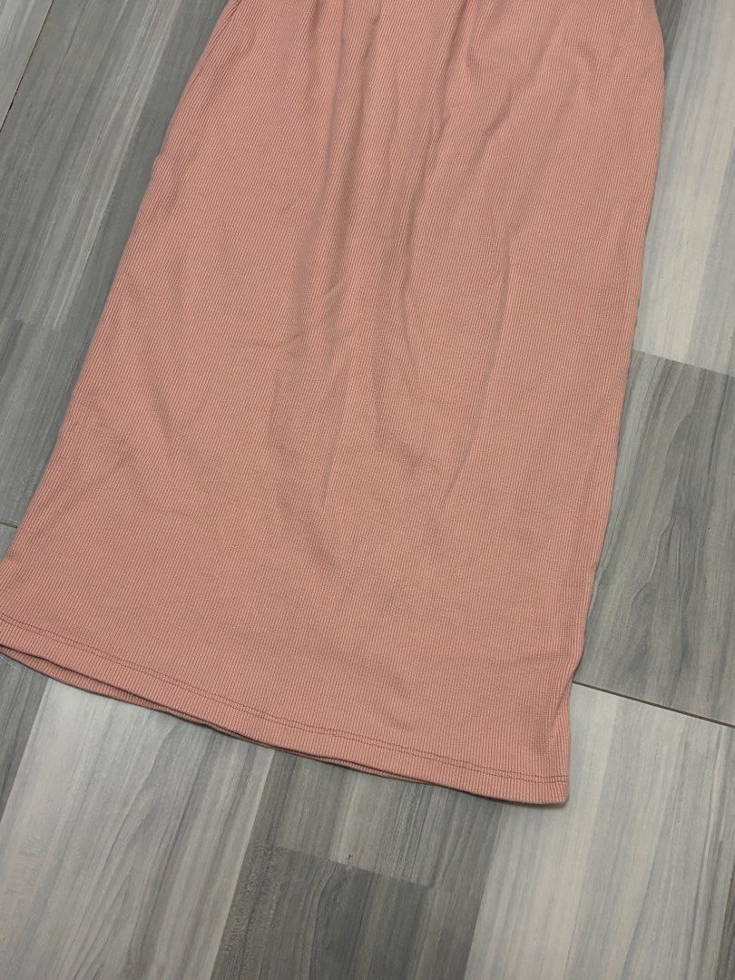 Pink Ribbed Midi Skirt (Category: Skirts) located in Manila. Submitted by lovedbynabix (Listing ID 1461447623, Image 3). Description: Comfy pink midi skirt with ribbed texture and elastic waist. Straight cut, calf-length. Versatile for any occasion..