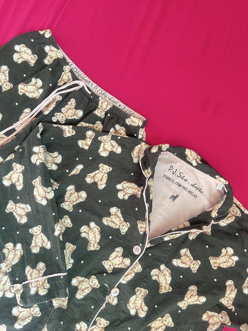 P.J. Sleep & Co. Teddy Bear Pajama Set (Category: Undergarments & Loungewear) located in Manila. Submitted by saintnasti (Listing ID 1461391974, Image 2). Description: - Cute teddy bear print - Dark green with light brown bears - Pink trim on collar and pants drawstring - Button-up top with long sleeves - Pants with elastic waistband - Super comfy for lounging.