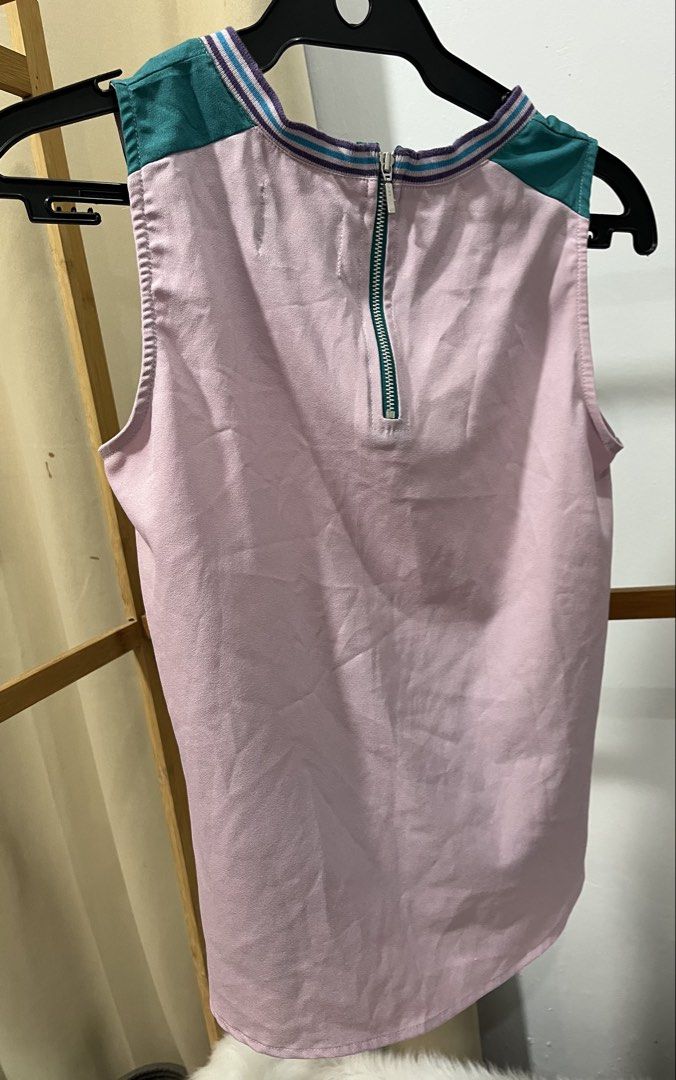 Plains & Prints Sleeveless Mountain Landscape Top (Category: Sleeveless) located in Batangas. Submitted by cndeclutter (Listing ID 1461479516, Image 2). Description: - Sleeveless top with a beautiful mountain and lake landscape print on the front. - Solid pink back with a convenient zipper closure. - Features a stylish striped trim on the neckline and armholes. - Ideal for creating a casual and eye-catching look..