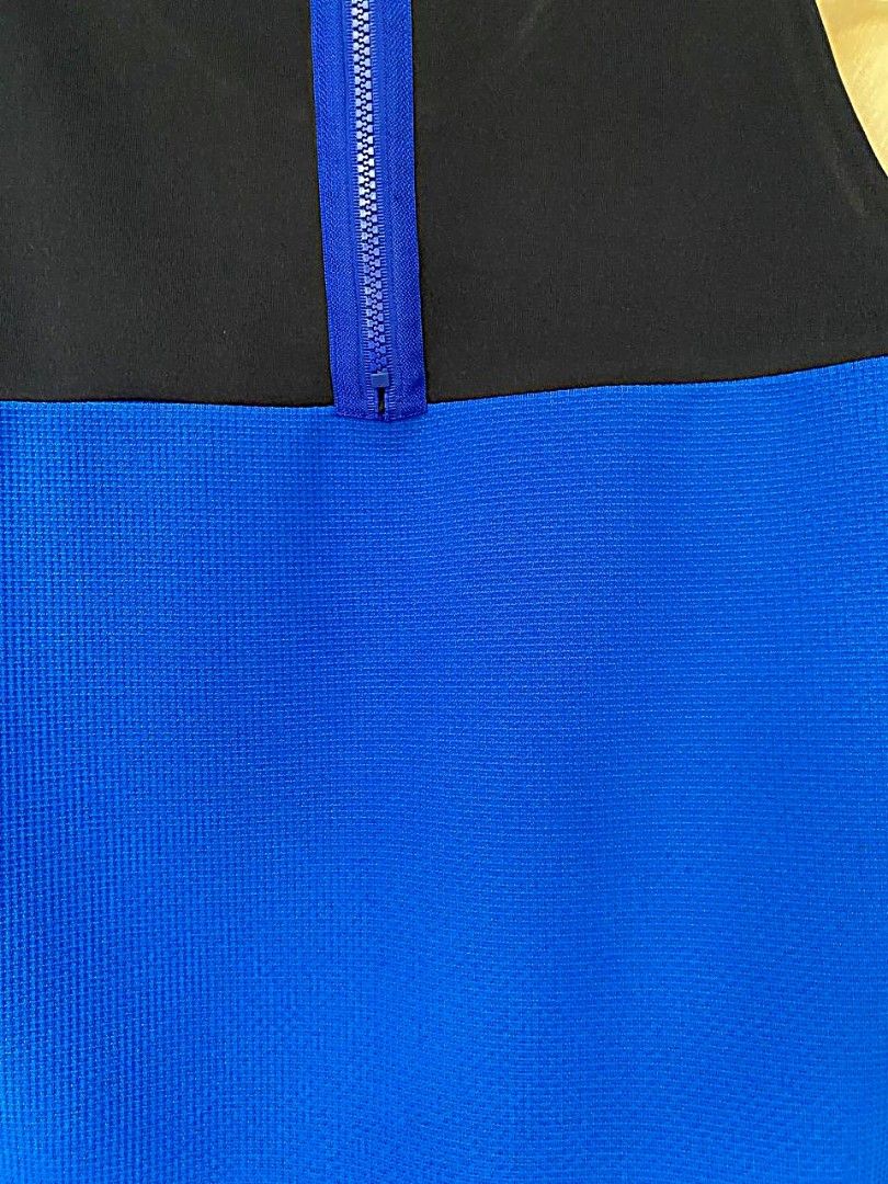 Plains and prints (Category: Dresses) located in Manila. Submitted by prettypink4 (Listing ID 1461374157, Image 2). Description: - Eye-catching zebra print dress - Front: Black and white with blue accents - Back: Solid blue with zipper closure - Sleeveless design - Perfect for making a bold fashion statement.