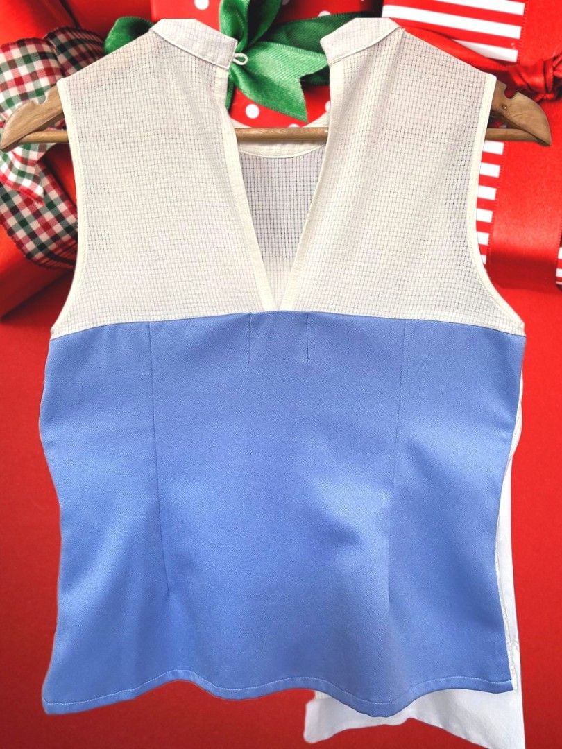 Plains and Prints Top (Category: Sleeveless) located in Manila. Submitted by prettypink4 (Listing ID 1461356188, Image 2). Description: - Sleeveless tank top - Waffle knit top half - Bold blue and white panel at the bottom - Features a red and blue floral graphic - Unique color blocking and print - Ideal for casual wear.