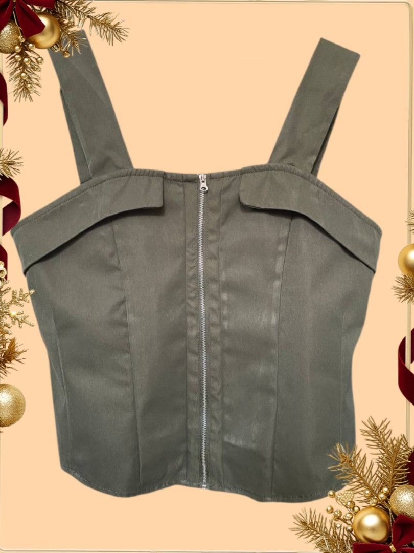 PLANS & PRINTS Corset Top (Category: Sleeveless) located in Manila. Submitted by prettypink4 (Listing ID 1461282588, Image 2). Description: - Olive green corset top - Collaboration: MARK NICDAO x PLANS & PRINTS Manila - Features: Front zipper, adjustable straps - Fit: Smocked back for comfort - size runs small can fit small and medium - Size: PHL 8 (UK 12, US 8) - Style: Perfect for dressing up or down.