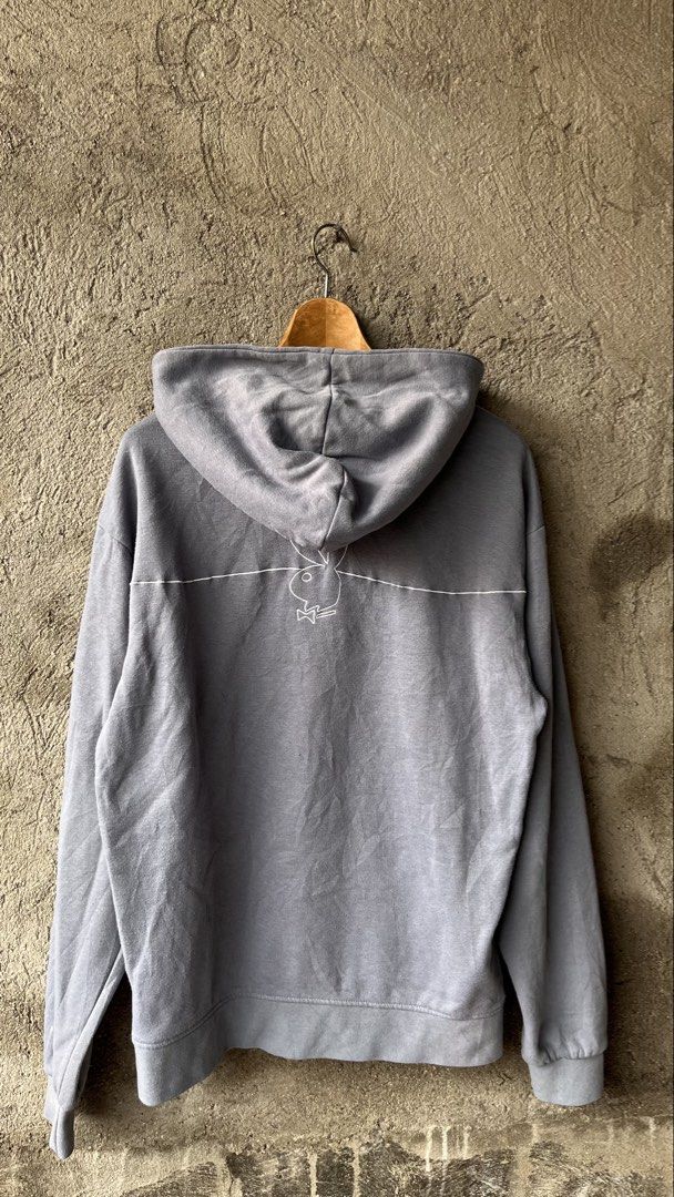 Playboy Grey Hoodie Size S/P (Category: Hoodies) located in Cabuyao City. Submitted by bulandos (Listing ID 1461428952, Image 2). Description: - Grey Playboy hoodie - Classic Playboy bunny logo on back - 'Playboy' text graphic on front - Kangaroo pocket - Hood with drawstrings - Made in China - Tagged S/P.