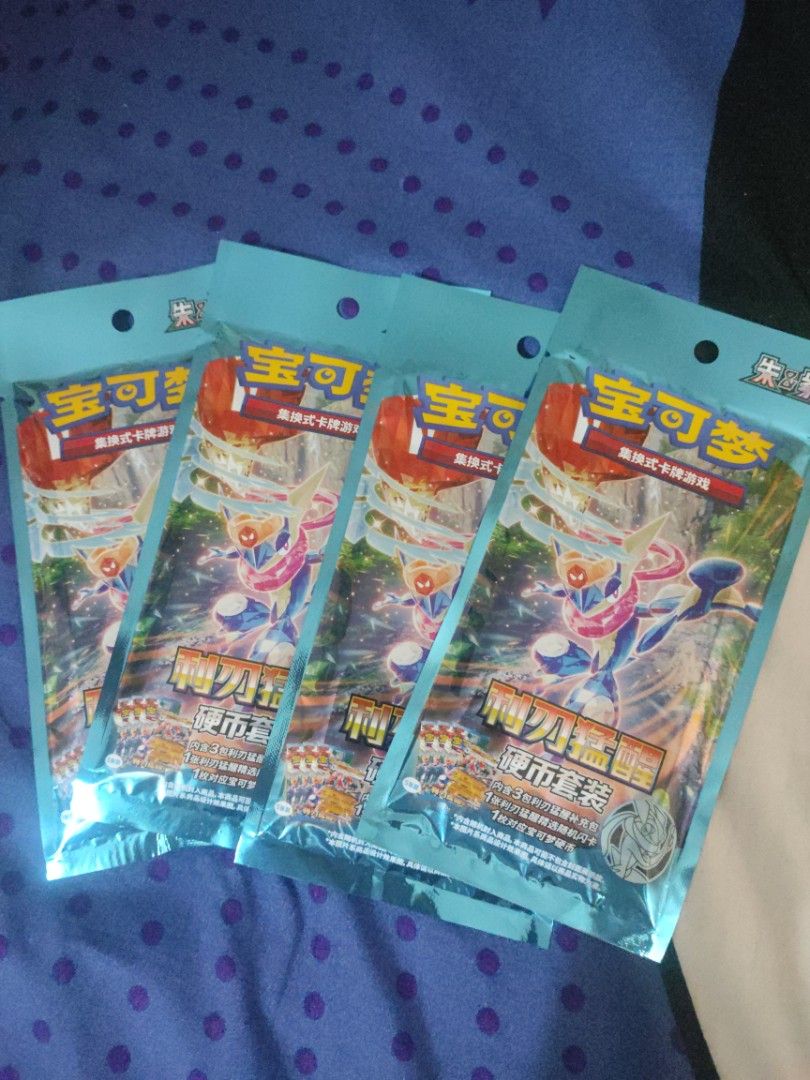 Pokemon Blade Awakened Coin Set (Category: Card Packs) located in Manila. Submitted by wwcollectibles (Listing ID 1461340278, Image 1). Description: The Simplified Chinese Blade Awakening Coin Set is a special Pokémon Trading Card Game blister pack that contains three 5-card slim booster packs, one random foil promo card, and a matching collector's coin.