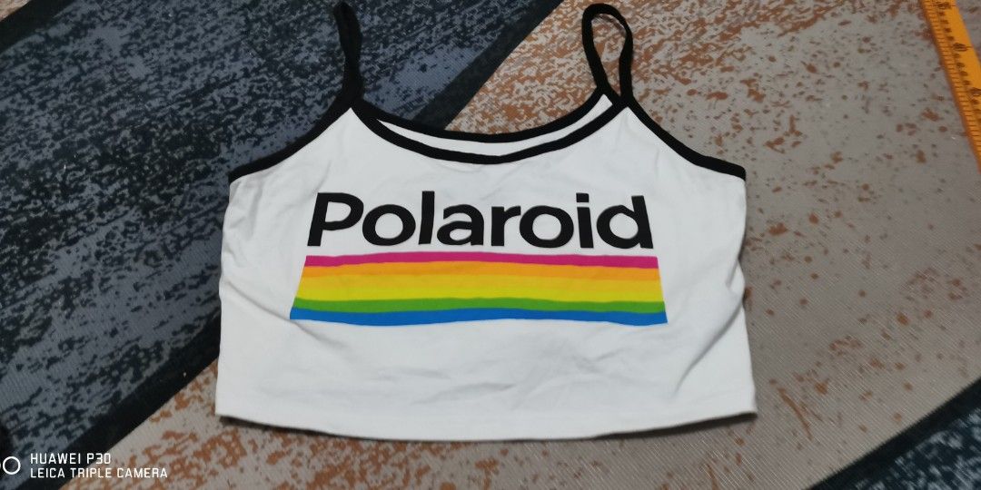 Polaroid graphic cropped tank top (Category: Sleeveless) located in San Jose. Submitted by thrift_ni_sir (Listing ID 1461473035, Image 1). Description: Add shipping fee MOP gcash MOD j&t Excellent condition.