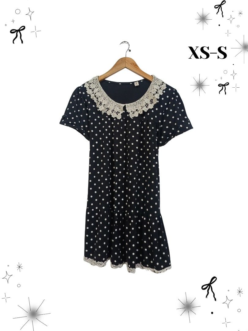 Polka Dot Dress with Lace Collar (Category: Dresses) located in Manila. Submitted by dear__riri__ (Listing ID 1461519680, Image 1). Description: - Adorable navy blue dress with classic white polka dots. - Features a charming lace collar and delicate lace trim at the hem. - Comfortable short sleeves. - Adjustable string tie at the back for a personalized fit. - Size: Fits XS to Small..