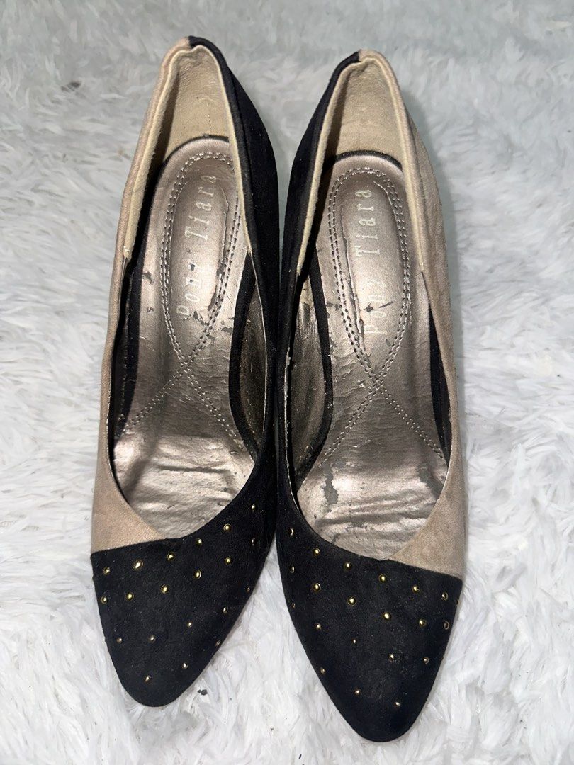 Pony Tiara Black & Tan Studded Pointed Toe Heels (Category: Heels) located in Davao. Submitted by waynerp (Listing ID 1461499295, Image 1). Description: - Pony Tiara black and tan heels - Size S/4 - Pointed toe with gold stud details - Comfortable for work or a night out - Insoles show some wear.