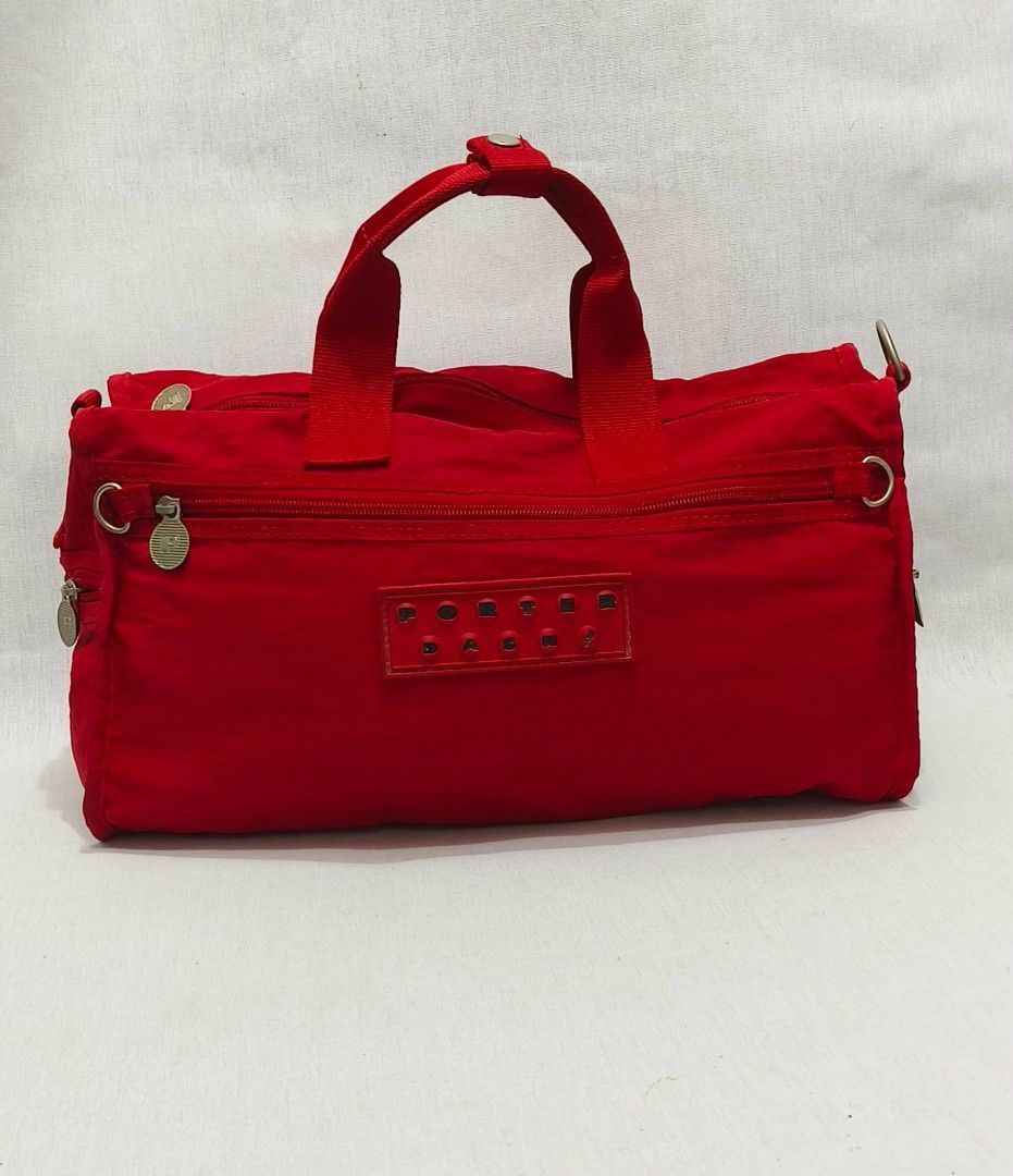 Porter Dash Duffle Bag (Category: Tote Bags) located in Baguio. Submitted by amagenbagsfashionshop (Listing ID 1461544233, Image 2). Description: PORTER DASH Duffle Bag Very good used condition Normal signs of wear With sling slot but no sling included 🙂 L:15" H: 8.5" D: 5" Good quality made Kindly check the Detailed photos Shipping via J&T only No COD and COP .