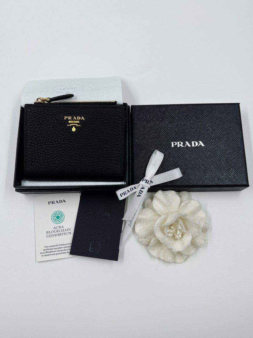 ⚜️Prada Card holder / wallet (Category: Luxury Bags & Wallets) located in Makati City. Submitted by 90sangel (Listing ID 1461424658, Image 2). Description: Tiny but make it PRADA. 🖤✨ Six card slots Two internal pockets Internal zipper coin compartment Perfect for your mini bags, night outs, or everyday errands! 🛍️💕.