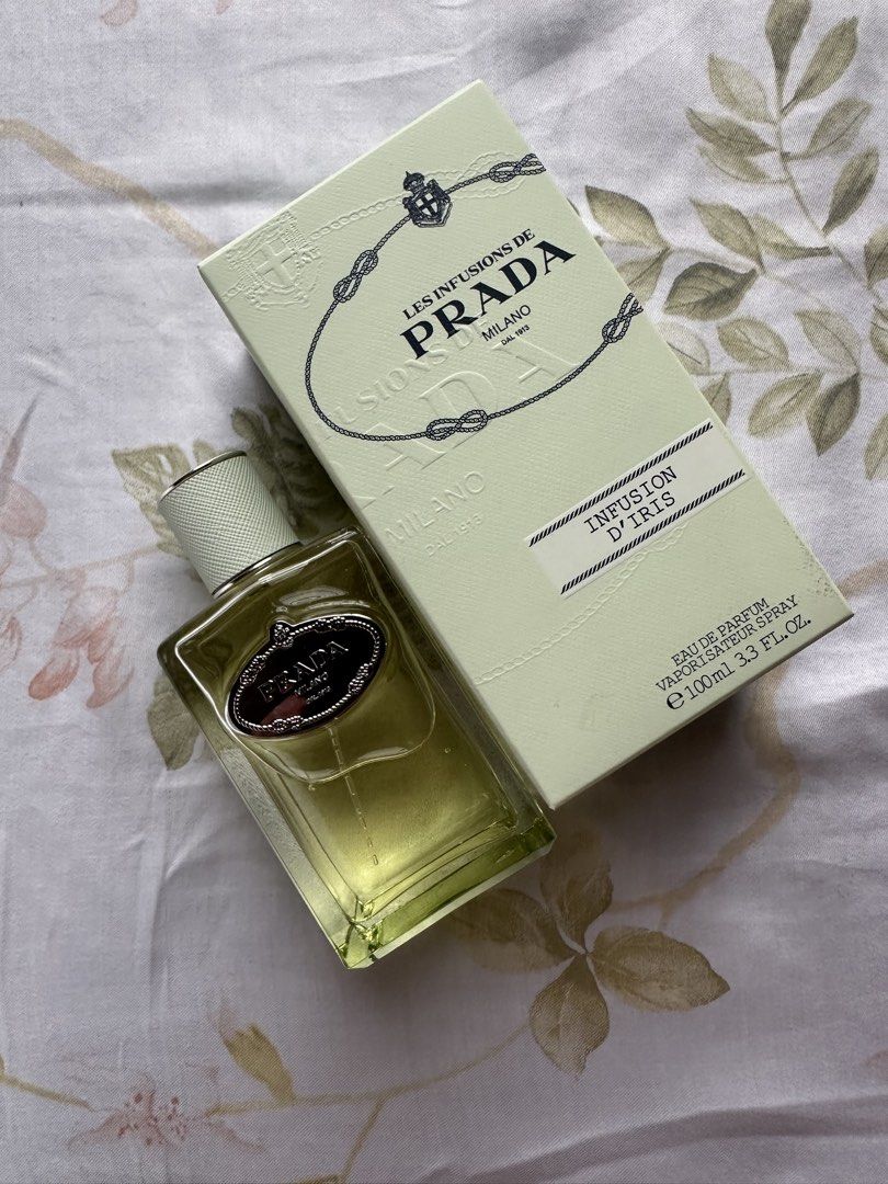 Prada Les Infusions de Prada Infusion d'Iris Eau de Parfum 100ml (Category: Fragrance & Deodorants) located in Muntinlupa City. Submitted by pushpop02 (Listing ID 1461423470, Image 2). Description: - Prada Infusion d'Iris Eau de Parfum - 100ml bottle - Includes original box -sprayed lang to smell - Part of the Les Infusions de Prada collection - Versatile scent for everyday or special events.