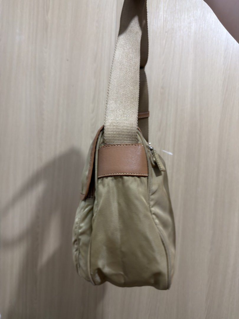 Prada Nylon & Leather Shoulder Bag (Category: Luxury Bags & Wallets) located in Manila. Submitted by maglips (Listing ID 1461507680, Image 2). Description: Guaranteed authentic Slightly negotiable Perfect pang gift sa boyfie or hubby 🤫.