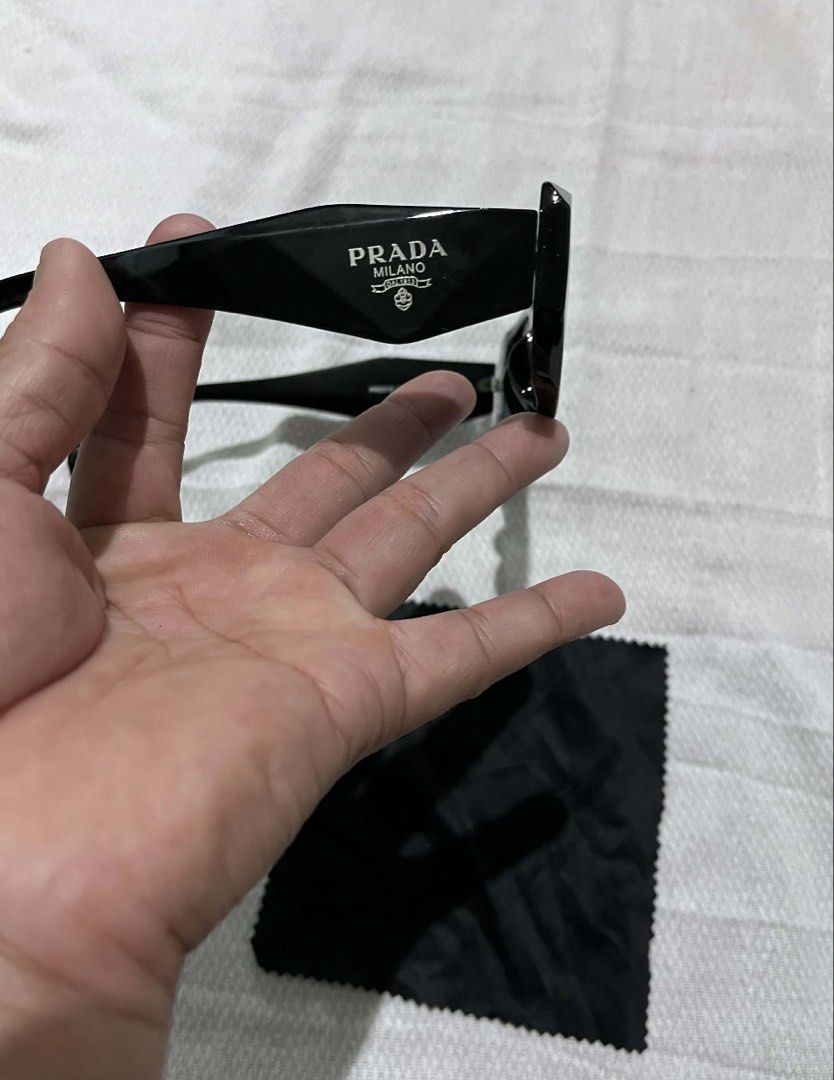 Prada PR2313 Sunglasses Black (Category: Sunglasses & Eyewear) located in Kabankalan. Submitted by miaangelar73343 (Listing ID 1461408933, Image 1). Description: Prada Sunglasses - Model: PR2313 - Frame Color: Black - Lens Color: Dark - Size: 54-20 145 - Includes: Soft Pouch & Cleaning Cloth - Ideal for everyday wear.