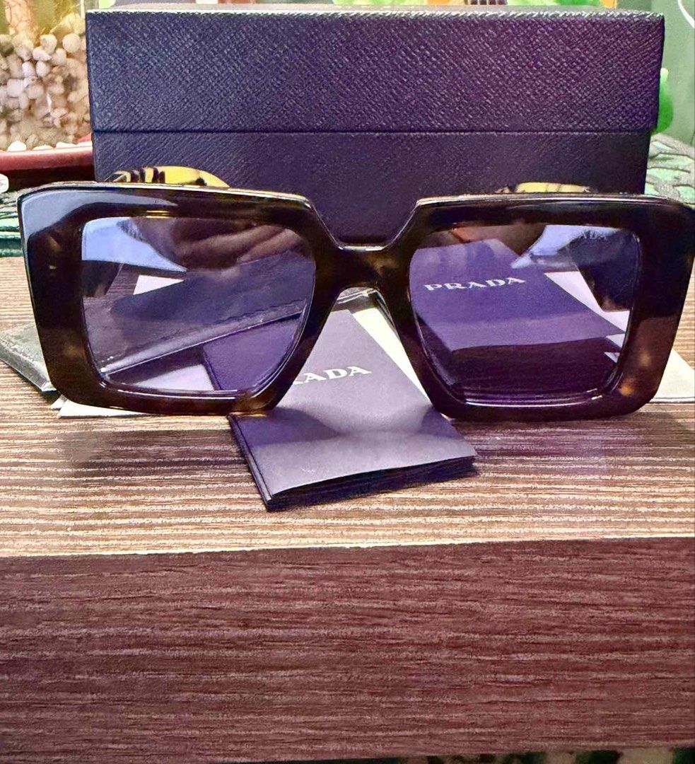 Prada PR23 Sunglasses (Category: Sunglasses & Eyewear) located in Calamba. Submitted by d_curated_market_17 (Listing ID 1461366809, Image 3). Description: Lightly Used AUTHENTIC Comes with box and hardcase Personal use SLIGHTLY NEGOTIABLE .