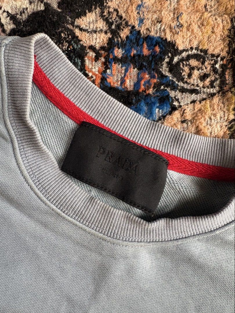 Prada Sweater (Category: Coats, Jackets and Outerwear) located in Pasay City. Submitted by namastenamstenamaste (Listing ID 1461386479, Image 3). Description: Prada Sweater issue: minimal yellow stain W:23 L:27.5 +sf.