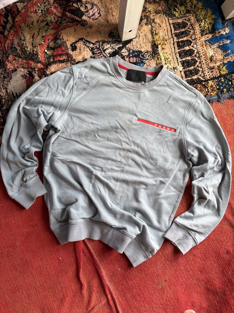 Prada Sweater (Category: Coats, Jackets and Outerwear) located in Pasay City. Submitted by namastenamstenamaste (Listing ID 1461386479, Image 1). Description: Prada Sweater issue: minimal yellow stain W:23 L:27.5 +sf.
