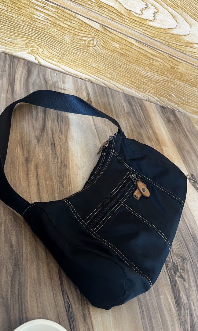 Preloved Authentic Esprit Nylon Shoulder Bag (Category: Shoulder Bags) located in Lubao. Submitted by mm.olshop (Listing ID 1461534507, Image 2). Description: Esprit Brand - Kili bag - Black and Brown in Color - Nylon & Leather Material -Lighweight Still good Condition! 🥰 📌Payment first 📌 Message us for more info. Happy Shopping! 🛍️😇 .