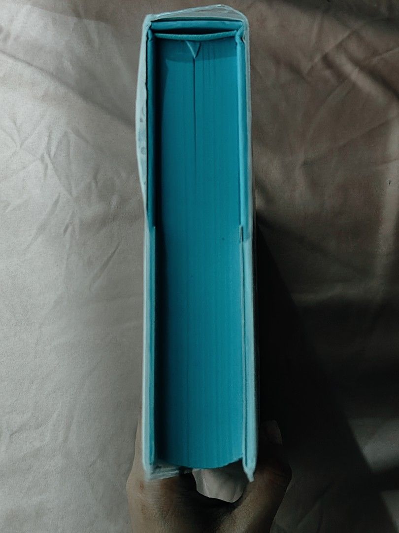 Pride and Prejudice - Artisan Edition (Category: Storybooks) located in Batangas. Submitted by eliza.reads.and.rehomes (Listing ID 1461473715, Image 2). Description: MOP: GCASH MOD: J&T EXPRESS Design: It features a light blue laser-cut slipcase or jacket with a silhouette of Elizabeth and Darcy. Special Features: The book includes colored page edges, a ribbon bookmark, and decorative pull quotes inside. Story: It is the classic romance and socia