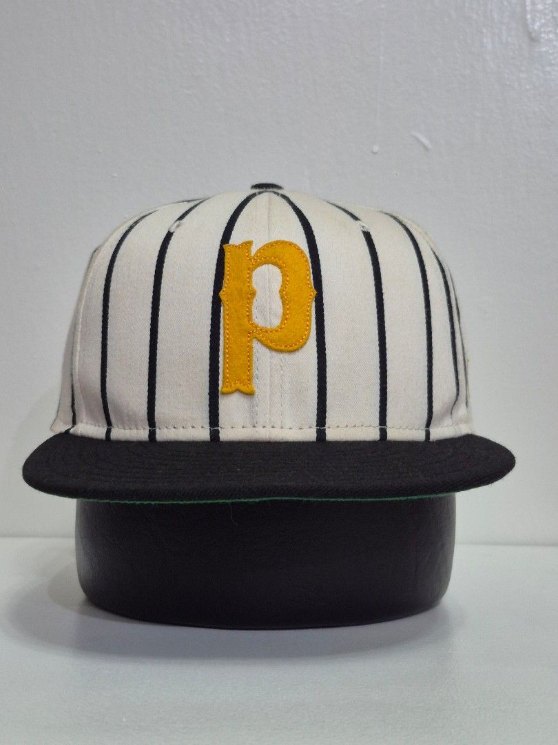 Primitive Striped Snapback Hat Yellow P Logo (Category: Caps & Hats) located in Pasay City. Submitted by blackmarket074 (Listing ID 1461528107, Image 2). Description: - White and black striped snapback hat - Features a yellow 'P' logo on the front - Black brim with a green underside - 'Primitive' embroidered on the back - Ideal for casual wear New Era X Primitive Skateboarding *Snapback *Deadstock 10/10 condition *just need wash (natambak) 10/10 