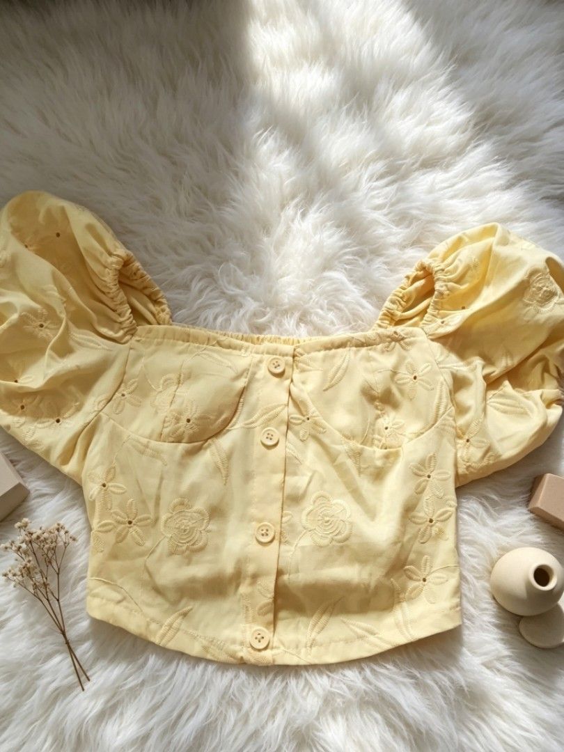 Puff-sleeve Crop top (Category: Others Tops) located in Valenzuela. Submitted by bravemountain89 (Listing ID 1461396772, Image 2). Description: Pastel yellow puff-sleeve crop top with a square neckline, delicate floral embroidery, elasticated sleeves, and decorative front buttons. Cute, feminine, and perfect for a sweet casual look.”.
