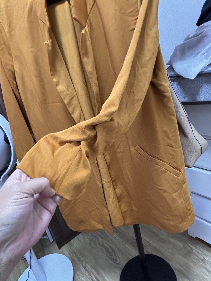 PULL&BEAR Outerwear Mustard Yellow Blazer (Category: Coats, Jackets and Outerwear) located in Quezon City. Submitted by frodo0905 (Listing ID 1461445884, Image 3). Description: - Mustard yellow blazer from PULL&BEAR - Open front with lapel collar - Three-quarter sleeves - Two front pockets - Made in Morocco - Ideal for layering over tops or dresses.