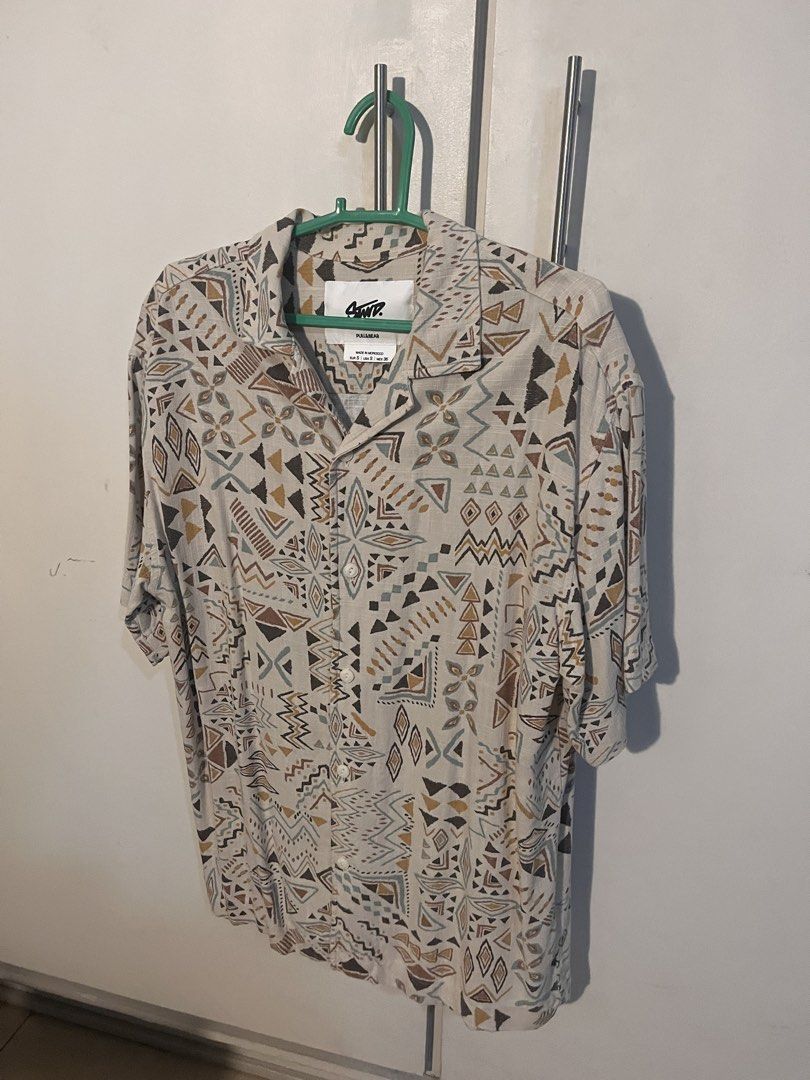 Pull&Bear Short Sleeve Geometric Button Up (Category: Tshirts & Polo Shirts ) located in Manila. Submitted by whosvelvet (Listing ID 1461490424, Image 1). Description: - Cool short sleeve shirt from Pull&Bear - Features a unique all-over geometric print - Made in Morocco - Size S - Great for casual wear - Negotiable - Buyer care of SF.