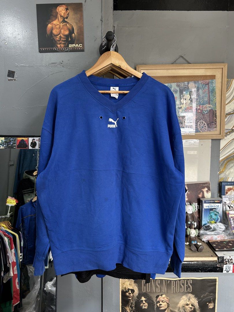 Puma Blue V-Neck Sweatshirt Size L (Category: Coats, Jackets and Outerwear) located in Davao. Submitted by ruggedthrift444 (Listing ID 1461561775, Image 1). Description: - Blue Puma sweatshirt - V-neck design with two eyelet details - Ribbed cuffs and hem - Ideal for casual wear - Size: L.